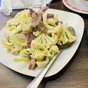Fried Chinese cauliflower with beef. A bunny.