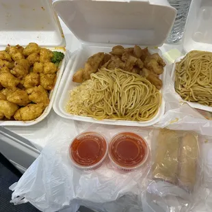 Left: General Tso's chicken Middle: sweet and sour chicken, half fried rice, half low mein 2 veggie rolls and low mein. $16 for everything