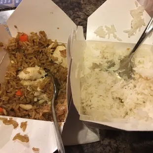 two take out boxes with rice and vegetables