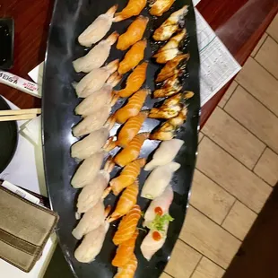 Assorted nigiri (shrimp, salmon, escalor, eel, Cajun salmon, tuna, yellowtail)