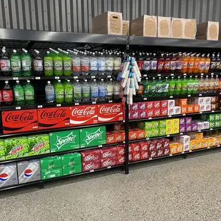 a display of sodas and soft drinks