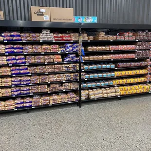 a variety of breads on shelves