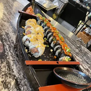 Spicy Tuna Roll &amp; can't remember the name of the other one. I was super excited to get it served on the boat