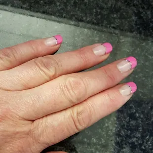 I work in the service industry.  My gel nails will last my at least 2 weeks.  She does beautiful work