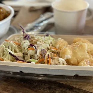 a meal in a styrofoam container