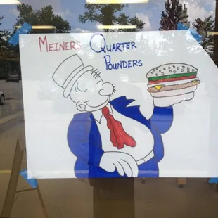 a man holding a sandwich