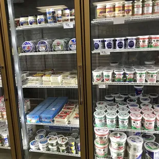 shelves of yogurt and other dairy products