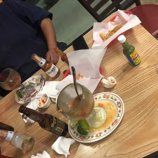 a table full of food and drinks