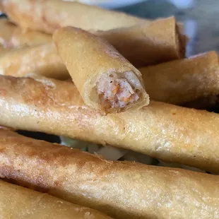 Lumpia (deep fried egg rolls with pork and veggies filling)