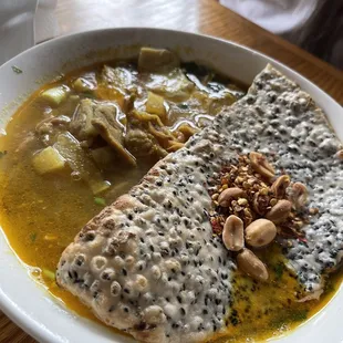 a bowl of soup and a sandwich