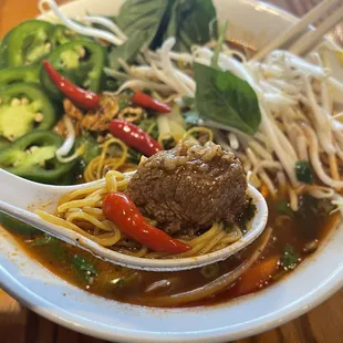 The beef was braised so perfectly and tender  36. Hu Tieu Mi Bo Kho