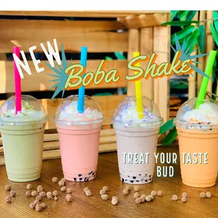 three boba shakes and three boba cups