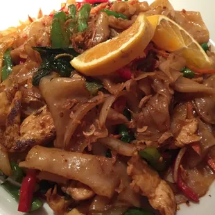 Egg noodles stir fried with protein and veg.  Can't recall the name.