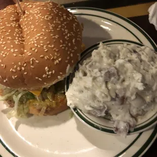 Hamburger plate with potato salad. Solid tasty burger!