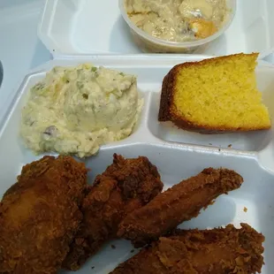 Fried chicken wings with potato salad, cornbread &amp; banana pudding.