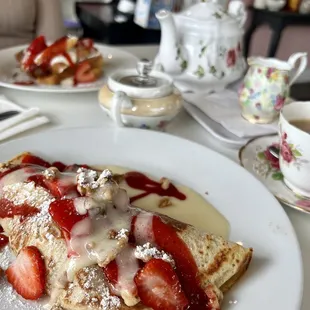 Crepe with pot of Hot Tea and Stuffed French Toast