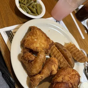 Four piece chicken dinner with Jojo&apos;s green beans