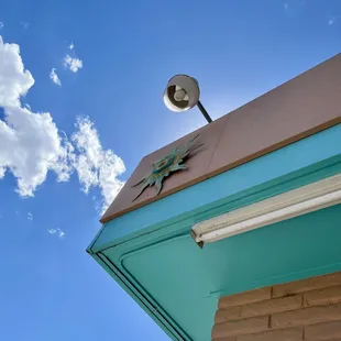 a clock on the side of a building