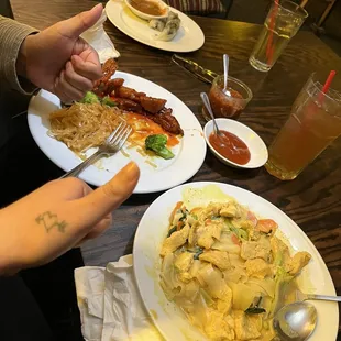 Yellow curry chicken with noodles  Orange Soy Chicken and broccoli with chow mein