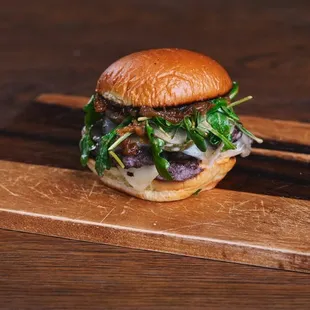 The Melly.  single patty, pepper jack cheese, arugula, onion jam, melaioli, pickles on potato roll