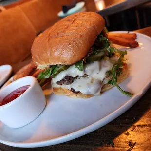 a burger and fries on a plate