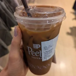 Decaf iced Americano w/ cinnamon and almond milk.