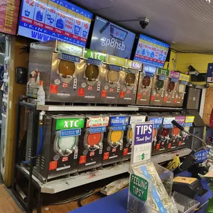 a row of vending machines in a convenience store