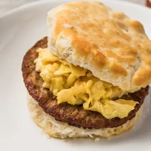a biscuit sandwich with eggs on it