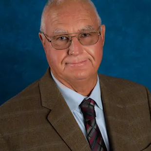 a man in a suit and tie