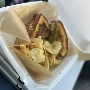a sandwich and chips