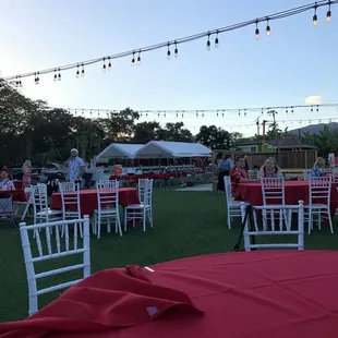 White tents are the buffet food line