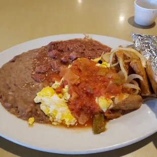 Chef&apos;s special: carne guisada, Ranchero eggs &amp; fresh corn tortillas.
