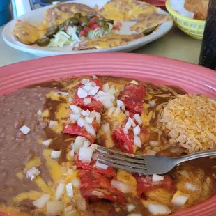 Happiness on a plate. Enchiladas, rice and beans