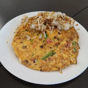 Chicken omelet with hashed browns