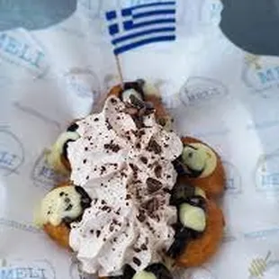 a dessert with whipped cream