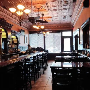 Love the bar! Check out the old time ceilings.