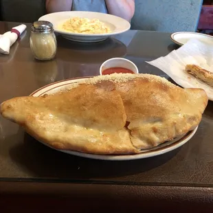 To say this Calzone was the size of a watermelon is almost dead on. This Calzone is massive and very cheap for the portion size.