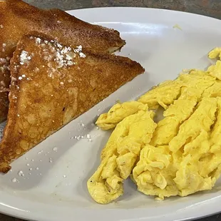 Side of French Toast and side of two eggs.