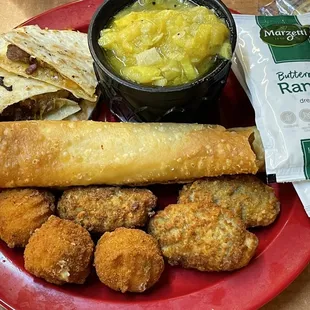 Pub Grub: steak quesadilla, 2 chicken taquitos, 3 southwest corn nuggets, 3 jalapeño poppers, and side of squash.
