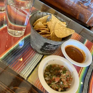 fresh crispy tortilla chips with delicious spicy house made salsa and pico de gallo