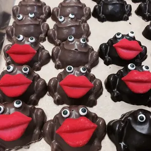 Freshly molded solid chocolate frogs with big smoochers