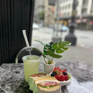 a sandwich and a drink on a table