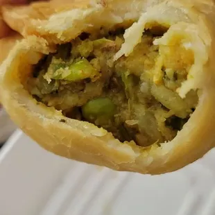 Beyond YUMMY!!! Veggie Samosas First time trying them, and they were so good, this family will get use to seeing me, LOL