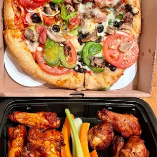 Delish oven roasted wings and small half &amp; half veggie/house special pizza.