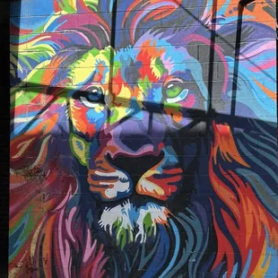Colorful lion artwork outside in the corridor!