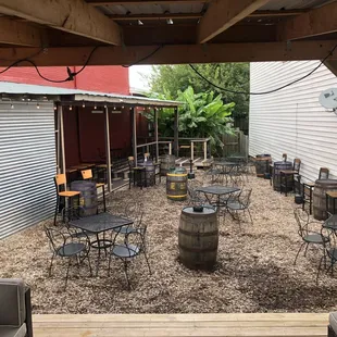 patio area with tables and chairs
