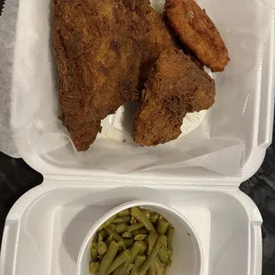Two piece white meat chicken dinner with two sides - green beans and a potato pancake $13.25