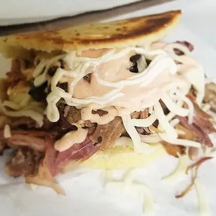 Arepa with our 12 hour braised pork