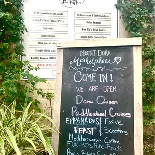 Located inside the Mount Dora market place in the back corner of the black awning marketplace building