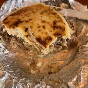 Half pork arepa! Was too tasty to wait